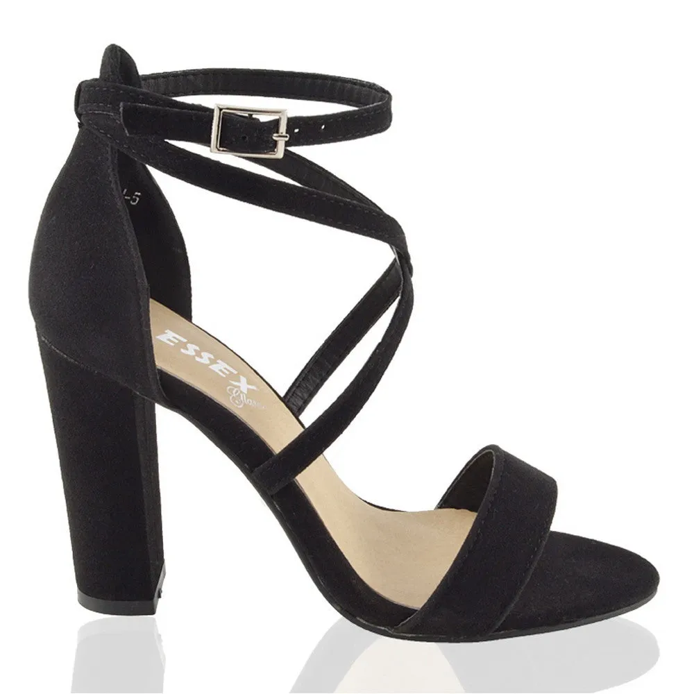 BRIELLA CROSS OVER FRONT STRAPPY BLOCK HIGH HEEL SANDALS IN BLACK FAUX SUEDE